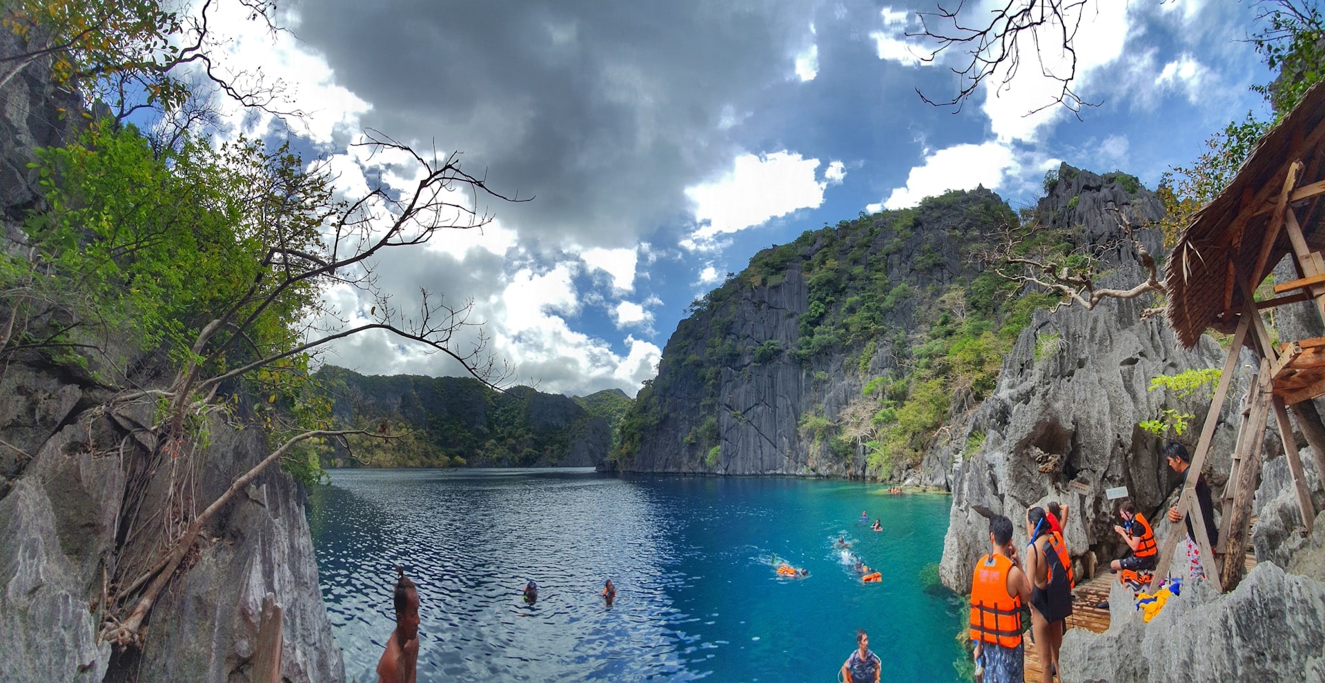 a panoramic view of people snorkeling in Barracuda Lake Coron Palawan Philippines