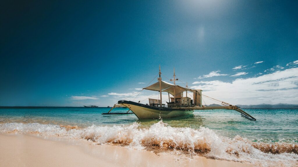 sunny beach boat Coron Palawan Philippines