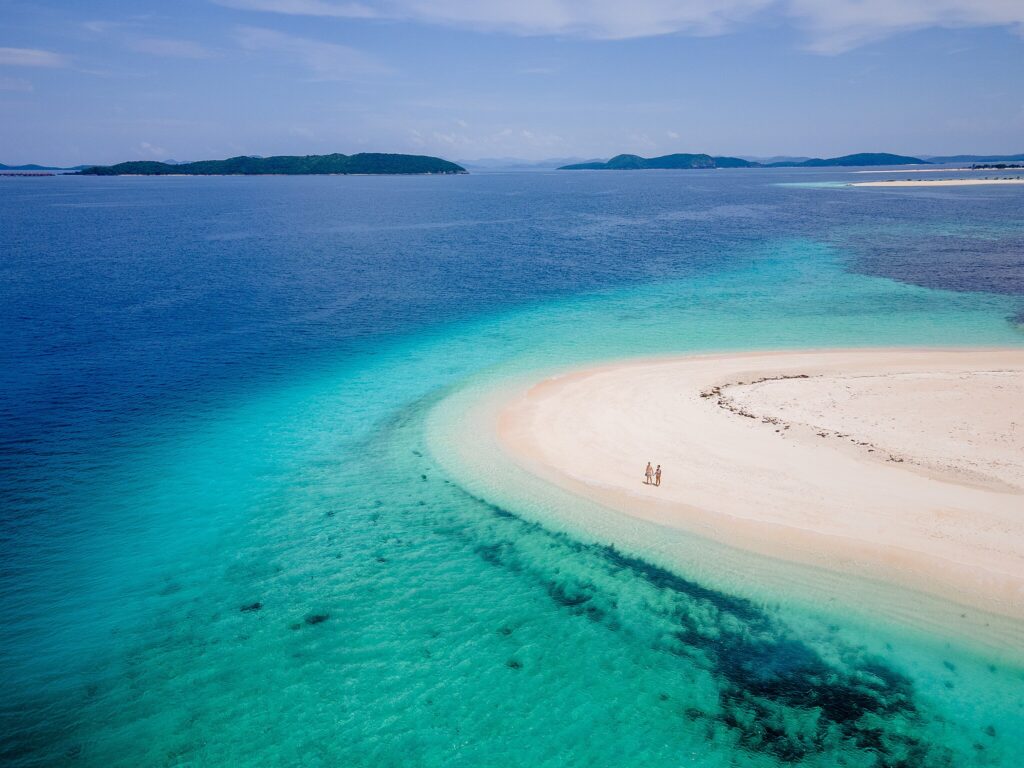 A couple enjoying their stay at North Cay Island in Busuanga, Palawan, Philippines.