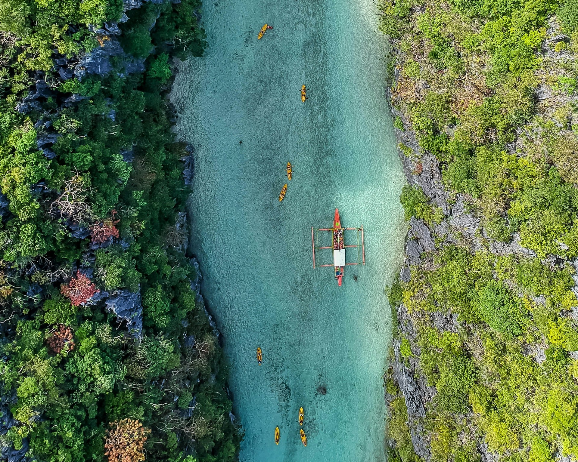 aerial view of tourist kayaking in small lagoon in El Nido Palawan Philippines