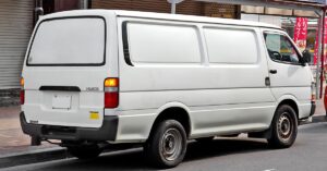 an airconditioned van used to transfer tourists from san vicente palawan to el nido